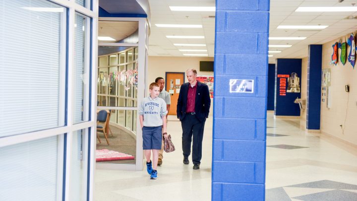 Assistant principal Larry Hodgkins walks the halls of Riverside Middle School.